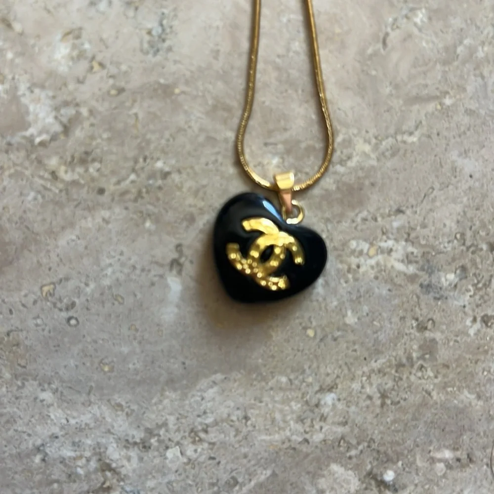 CHANEL Black Heart Pendant Necklace with Gold CC Emblem
